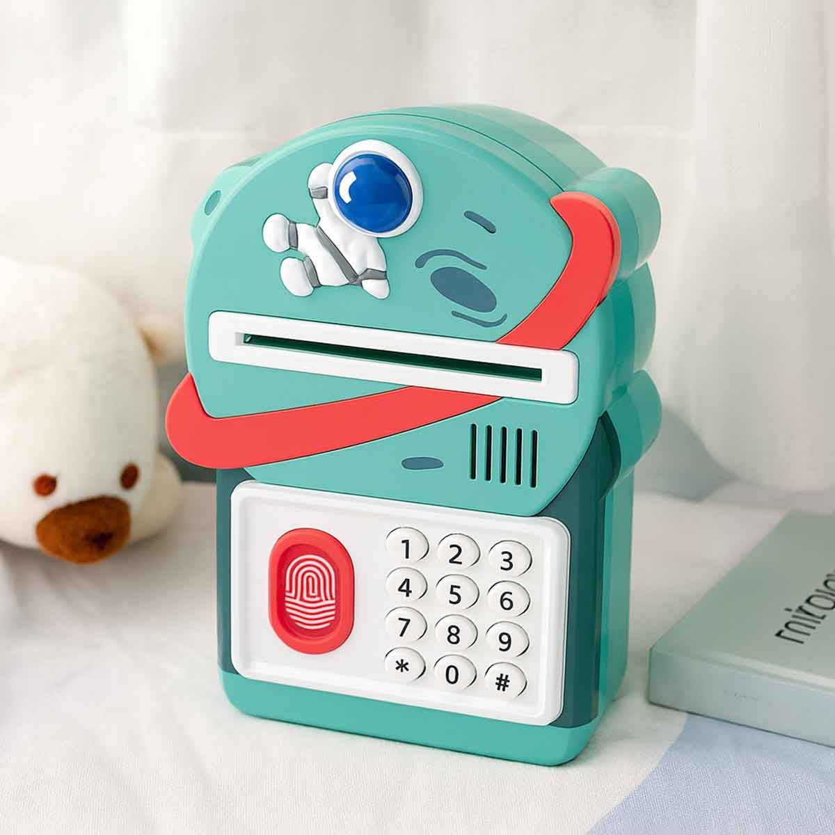 ليتل ستوري حصالة على شكل رائد فضاء باللون الأخضر مع قفل بصمة وموسيقى