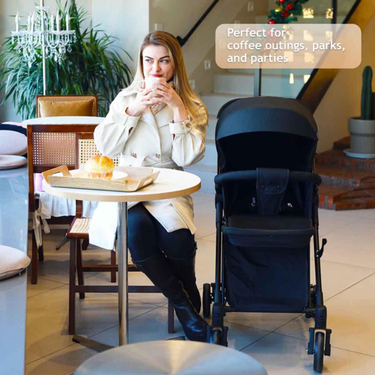 عربة أطفال تيكنوم سوداء مع كرسي هزاز وحقيبة حمل حفاضات وردية أنيقة للأطفال الصغار، من عمر 0 إلى سنتين